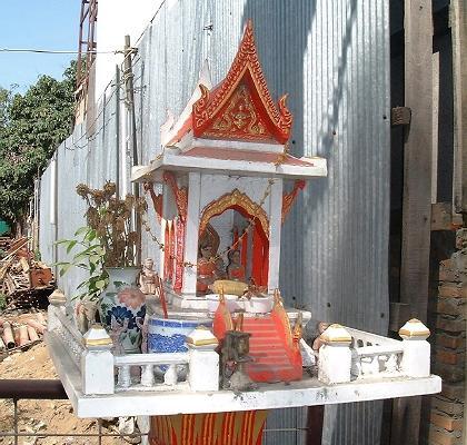 A small shrine, by a vacant lot in downtown Chiang Mai... not unlike ones you see all over Thailand