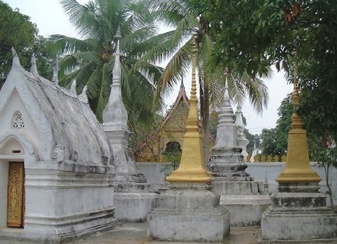 Stupas (white and gold) at Wat Mai Suwannaphumaham, Luang Prabang