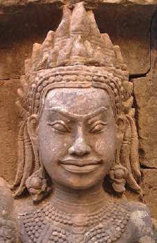 One of many, many smiling faces at Angkor Thom