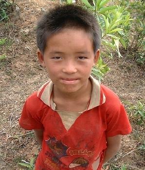 Young boy at the strange Plain of Jars (Phonsavan, northern Laos)